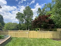 <b>4 foot high Pressure Treated Wood Board on Board Fence with Diagonal Lattice and arched single walk gate</b>